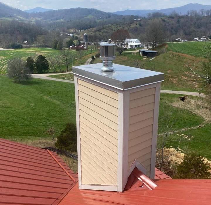 Custom metal chase cover on vinyl chimney chase in Western North Carolina